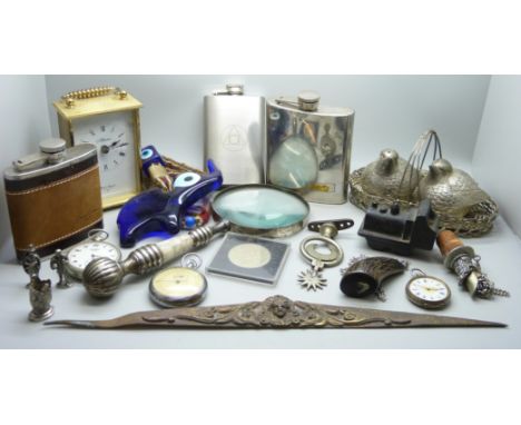 A box containing pocket watches, a pair of salt and pepper cellars in the form of birds, hip flasks, magnifying glass, etc.