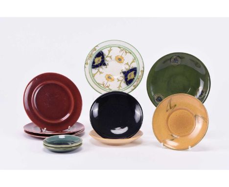 A group of Moorcroft saucers and pin dishes, including a Macintyre &amp; Co saucer, M826, 13.5cm diameter; an Art Nouveau sty