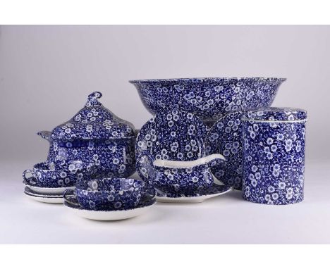 A Burleigh Ironstone 'Calico' dinner service, 20th century, transfer-printed in blue, the service comprising 1 large casserol