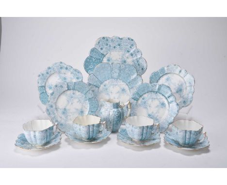 A Wileman Foley 'Daisy' shape part tea service in the 'Jungle' pattern, late 19th century, transfer-printed in blue, comprisi