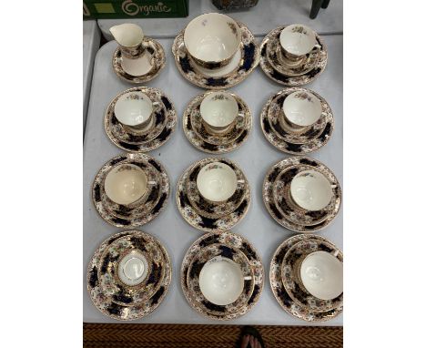 A LARGE CERAMIC TEASET TO INCLUDE CUPS, SAUCERS AND PLATES 