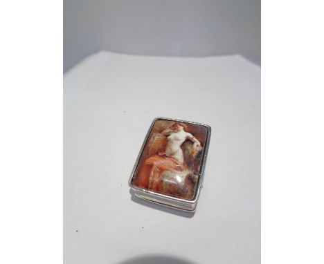 A MARKED SILVER PILL BOX WITH AN ENAMEL EROTIC DESIGN TOP 