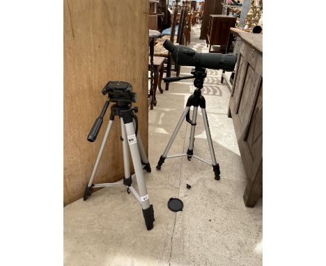 A TELESCOPE AND THREE TRIPOD CAMERA STANDS 