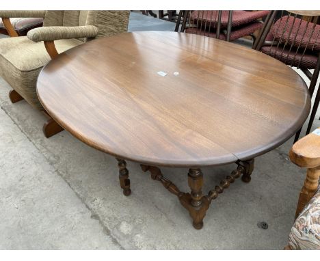 AN ERCOL TWIN-LEAF COFFEE TABLE 