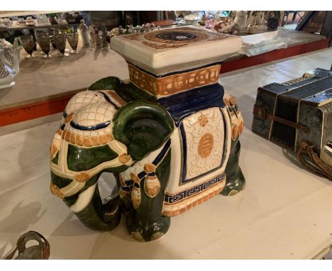 A LARGE CERAMIC ELEPHANT STAND 