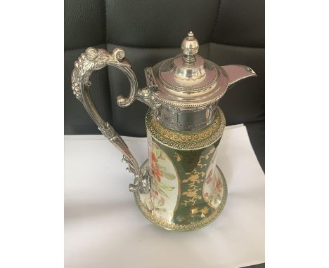 A VICTORIAN ALOCK BURSLEY CERAMIC CLARET JUG WITH ORNATE SILVER PLATED TOP 