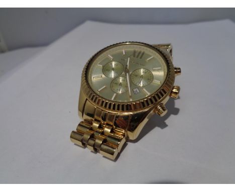 A GILT CHRONOGRAPH FASHION WATCH SEEN WORKING BUT NO WARRANTY 