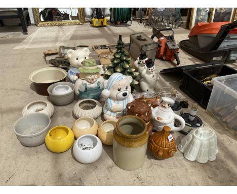 A LARGE ASSORTMENT OF CERAMIC WARE TO INCLUDE BISCUIT BARRELS, TEAPOTS AND LAMPS ETC 