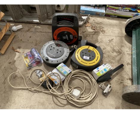 AN ASSORTMENT OF EXTENSION LEADS AND LIGHT BULBS ETC 
