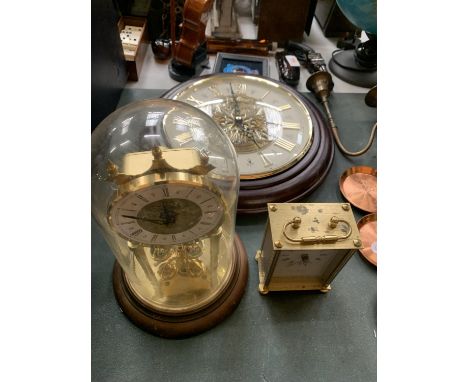 THREE CLOCKS TO INCLUDE ONE ORATE SEIKO WALL CLOCK, AN ANNIVERSARY CLOCK AND A CARRIAGE CLOCK 