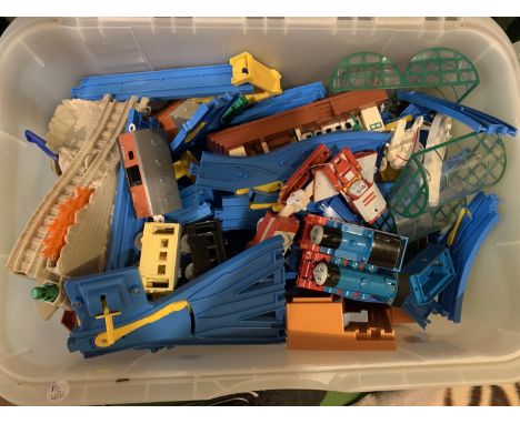 A BOX OF TOMY TRAIN TRACKS AND RELATED PIECES TO INCLUDE THOMAS THE TANK ENGINE AND FRIENDS TOYS 