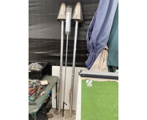 A PAIR OF GARDEN PATIO HEATERS AND A LIGHT 