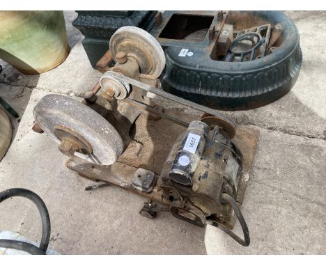 A VINTAGE TWIN WHEELED BENCH GRINDER 