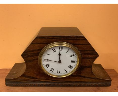A DECO STYLE WOODEN MANTLE CLOCK 