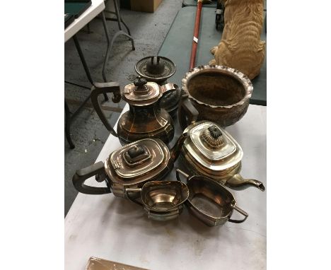 A SELECTION OF SILVER PLATED ITEMS. TO INCLUDE TEA POTS, COFFEE POTS, OIL LAMP BASE 
