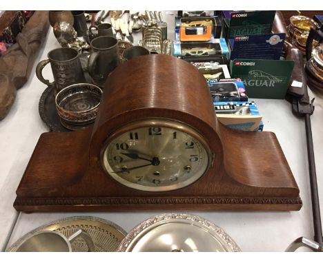 A LARGE NAPOLEAN HAT STYLE MANTLE CLOCK 