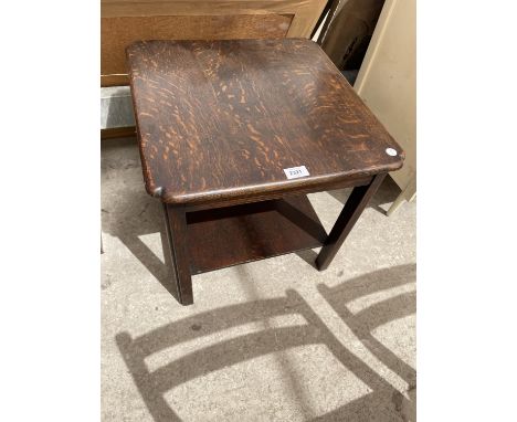 AN OAK OCCASIONAL TABLE WITH LOWER SHELF 