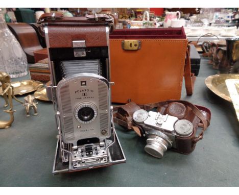 A VINTAGE POLAROID CAMERA WITH CASE AND A FURTHER PAXETTE CAMERA 