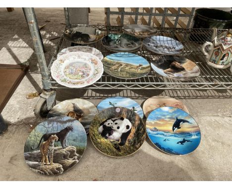 AN ASSORTMENT OF CERAMIC PLATES DEPICTING ANIMALS 