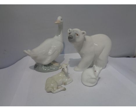 FOUR EXAMPLES OF CERAMIC ANIMALS TO INCLUDE A NAO DUCK, A LLADRO POLAR BEAR AND LAMB 