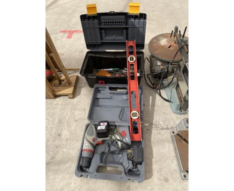 A BATTERY DRILL AND FURTHER TOOLS 