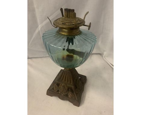 A VINTAGE APPLE GREEN GLASS BRASS OIL LAMP 