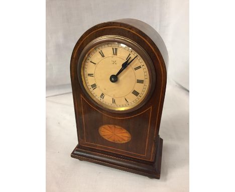 AN INLAID MAHOGANY MANTLE CLOCK 