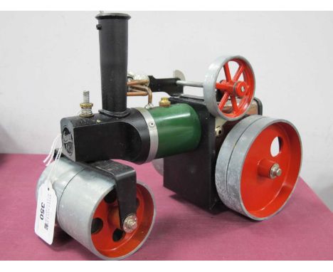 A Mamod SR1A Steam Roller, appears complete, some signs of wear and storage wear, rear scuttle adapted box, box has damp dama