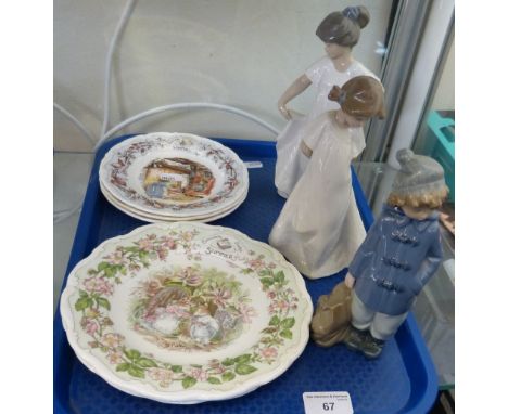 Three Nao figures together with five Royal Doulton Brambly hedge plates