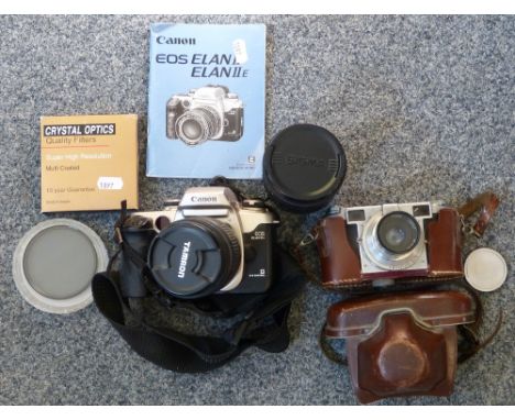 Camera equipment - A Canon Eos Elan 2E camera with Tamron 28/300 lens and an additional Sigma 28/200 lens and Lordomat camera