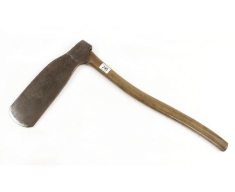 A shipwright's blocking axe 15 1/2" blade with a 4 1/2" edge and an ash handle by Henry Carter G