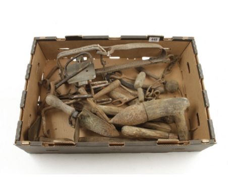 A quality of gardening tools and a gin trap rusty G- 