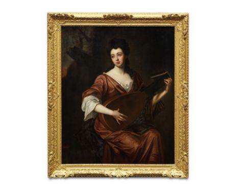 Attributed to Michael Dahl the Younger (Stockholm circa 1659-1743 London)Portrait of a lady, three-quarter-length, playing a 