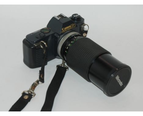 A Canon T50 camera, other cameras, binoculars and tripod stand etc Condition Report: Available upon request