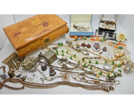 A collection of silver and vintage costume jewellery to include decorative Albertinas, guard chains etc Condition Report: Ava