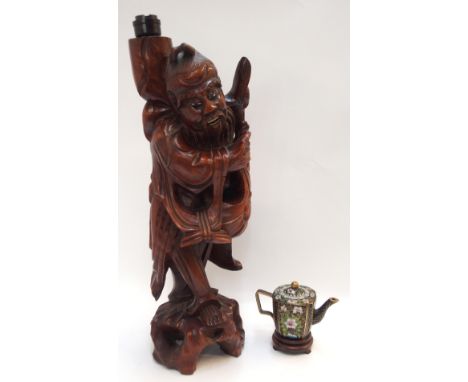 A Chinese carved wood figure of a sage, 40cm high (converted to a lamp) and a small cloisonne teapot, 8cm high, on wood stand