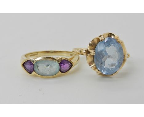 A 9ct gold blue topaz and amethyst ring, size K1/2 and a 9ct gold blue gem ring size K1/2, weight together 4.3gms Condition R