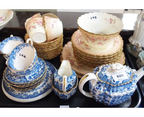 A Spode willow pattern part teaset, and a blush porcelain part teaset Condition Report: Available upon request