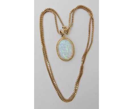 A 9ct gold opalite pendant 2.8cm x 1.6cm and 9ct box chain length 50cm, weight 7.7gms Condition Report: light general wear. O