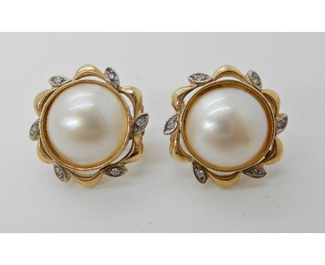 A pair of 9ct gold mabe pearl and diamond pierced ear clips, diameter of the pearls 13.5mm, diameter of earrings approx 20mm,