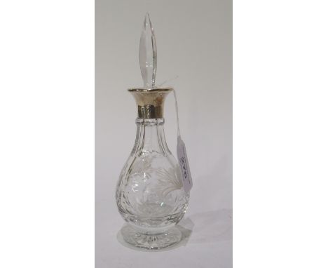 A silver mounted scent bottle by Asprey &amp; Company Limited, London 1985, the baluster shaped body with foliate engraving, 