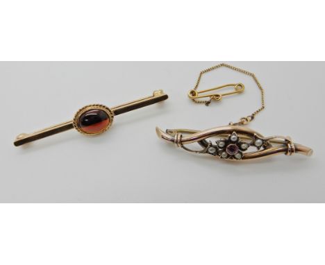 A 9ct gold amethyst and pearl vintage brooch together with a 9ct gold garnet brooch Condition Report: Vintage brooch has a me