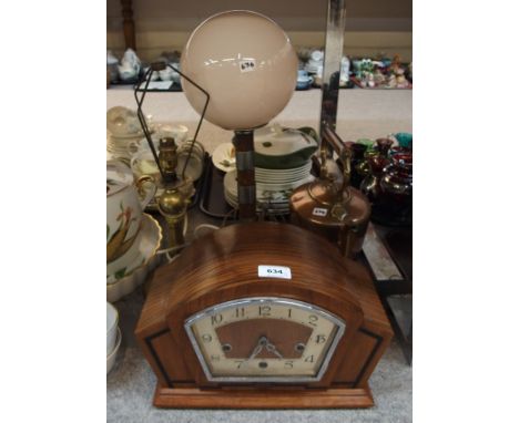 An Art Deco clock, copper kettle, two table lamps and fans Condition Report: Condition report not available on this lot. 