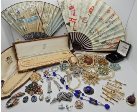 A collection of vintage costume jewellery and two fans Condition Report: Available upon request