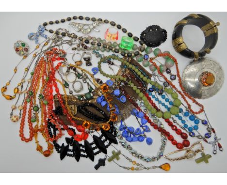 A collection of vintage costume jewellery to include Art Deco beads, large plaid brooch Condition Report: Available upon requ