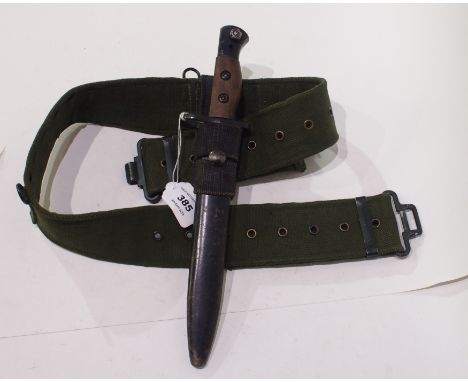 A No. 5 jungle bayonet in scabbard with frog and belt, 31cm overall length Condition Report: Available upon request