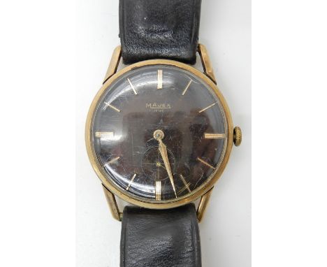 A 9ct gold cased Majex gents watch, diameter 3.4cm, weight 33.9gms including mechanism and strap Condition Report: Available 