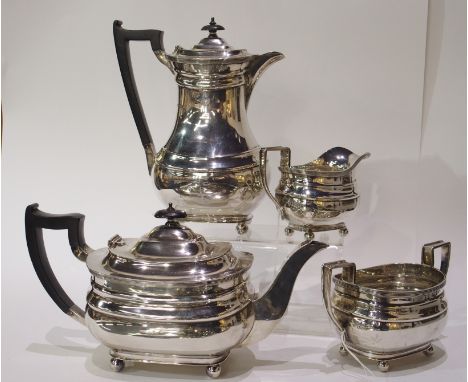 A four piece silver tea service by Harrods Limited (Richard Woodman Burbridge), Sheffield 1936, of rounded rectangular form w