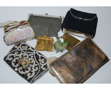 A vintage ladies mesh purse, other purses and an Egyptian assuit with white-metal decorations Condition Report: Available upo