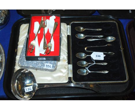 A tray lot of EP an silver cutlery - a part set of silver teaspoons and tongs, Sheffield 1927, EP cake forks, EP soup ladle e